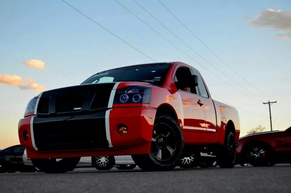 Race red with black and white stripe 2007 Nissan Titan Stock