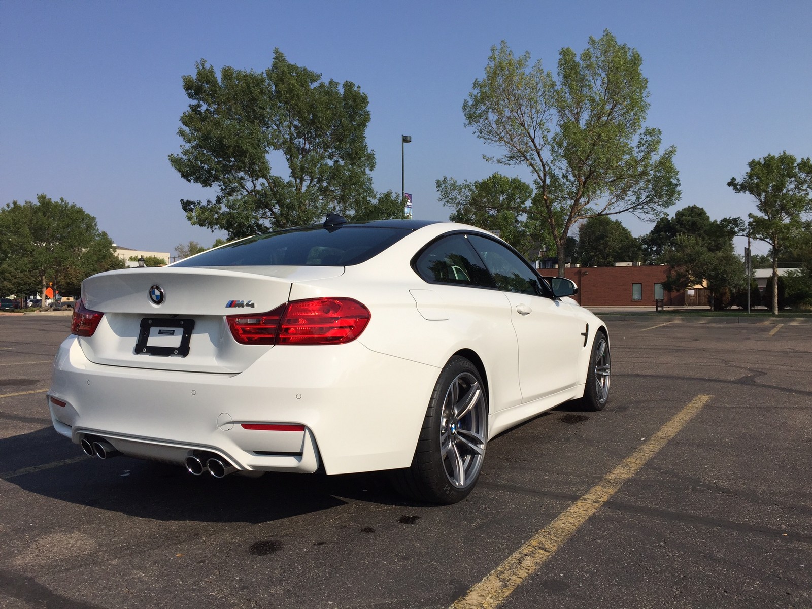 White 2015 BMW M4 