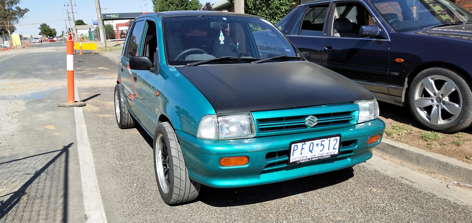 Green 1998 Suzuki Alto 