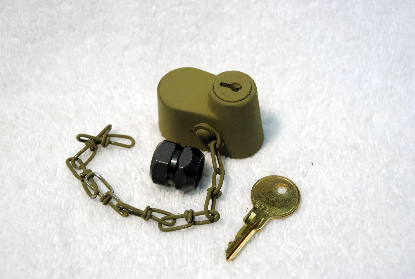 Willys MB Ford GPW Spare Tire Lock.  Includes Nut and H700 Key.