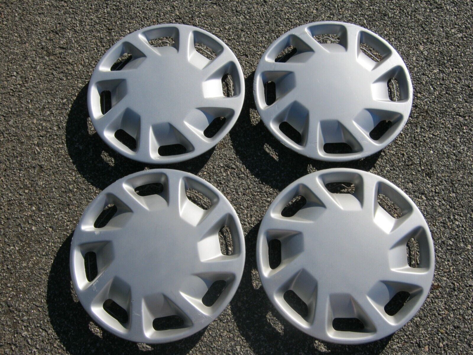 Genuine 1989 to 1992 Ford Probe 14 inch hubcaps wheel covers
