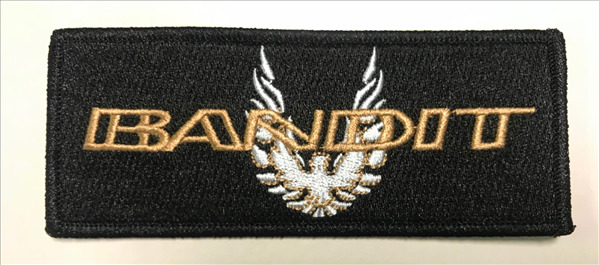 Black BANDIT patch with GOLD embroidered logo with silver and gold bird centered