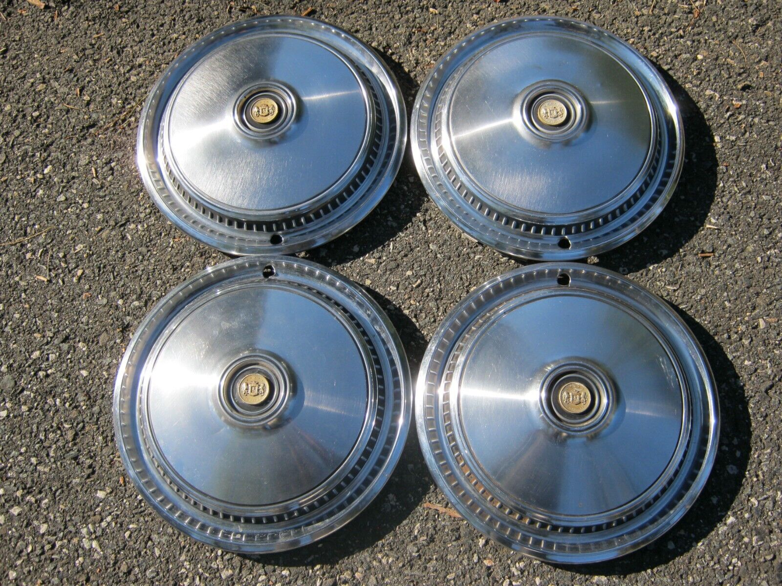 Genuine 1975 to 1979 Chrysler Cordoba 15 inch hubcaps wheel covers