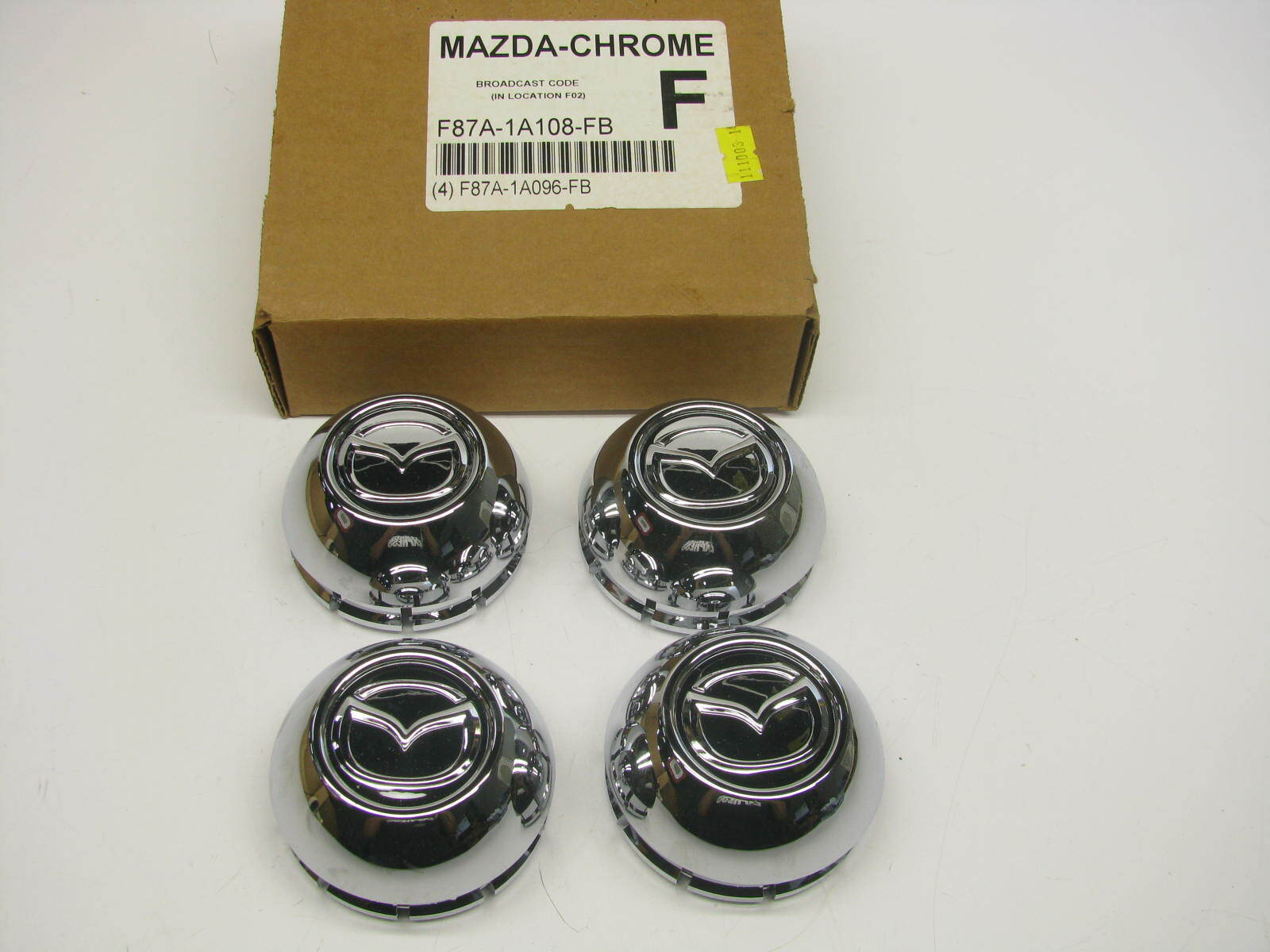 (4) OEM Mazda F87A-1A108-FB Wheel Center Caps  1998-2003 B2300 B3000 B4000 Truck