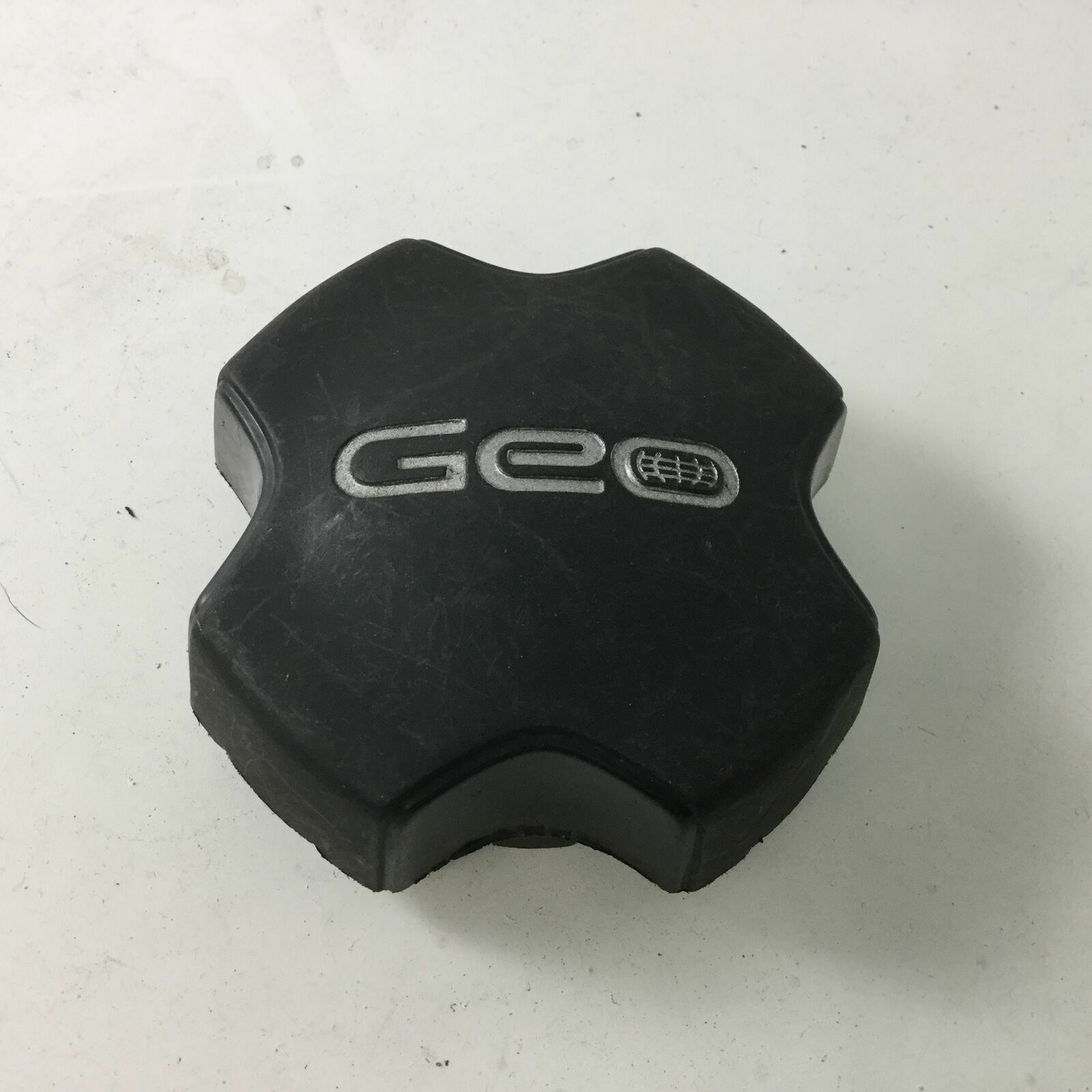 Geo Prizm Factory Black OEM Wheel Center Cap 4263801040 HOL 60165 GEO0