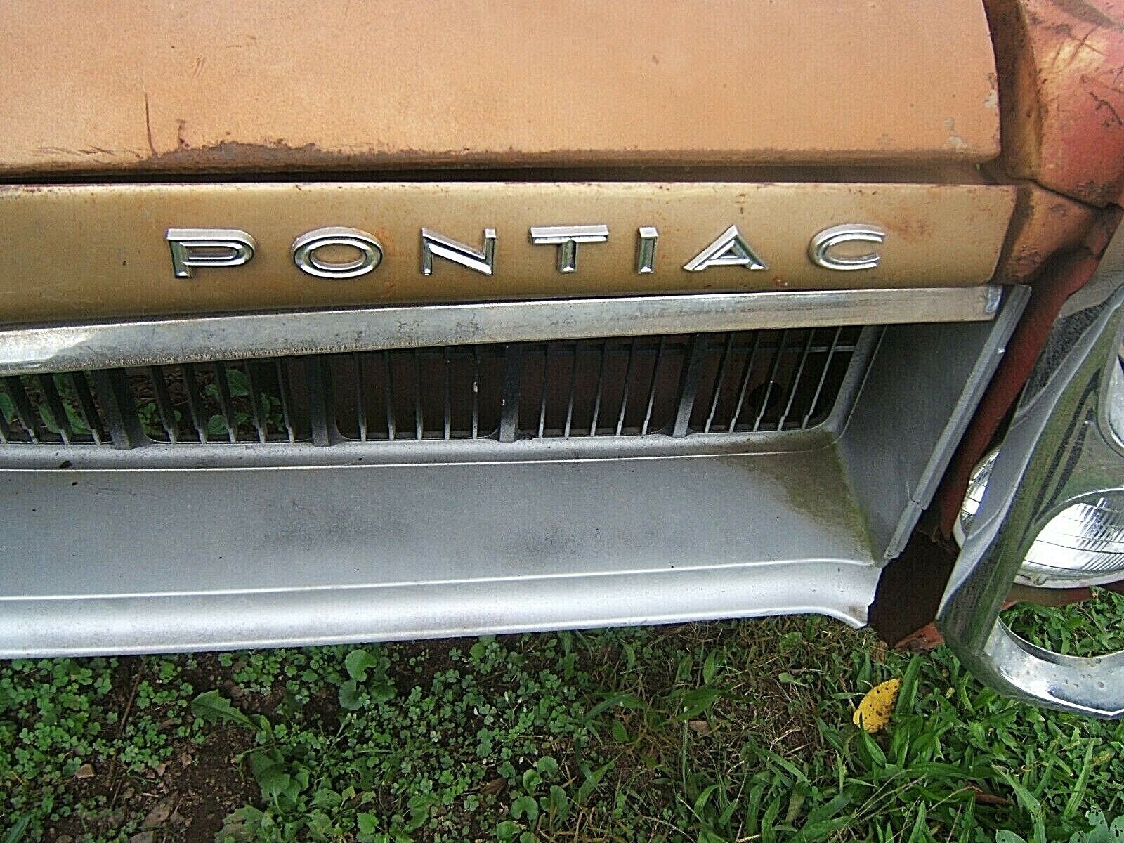 1967 Pontiac Lemans Tempest Upper Header Panel  PONTIAC LETTERS EMBLEMS  OEM