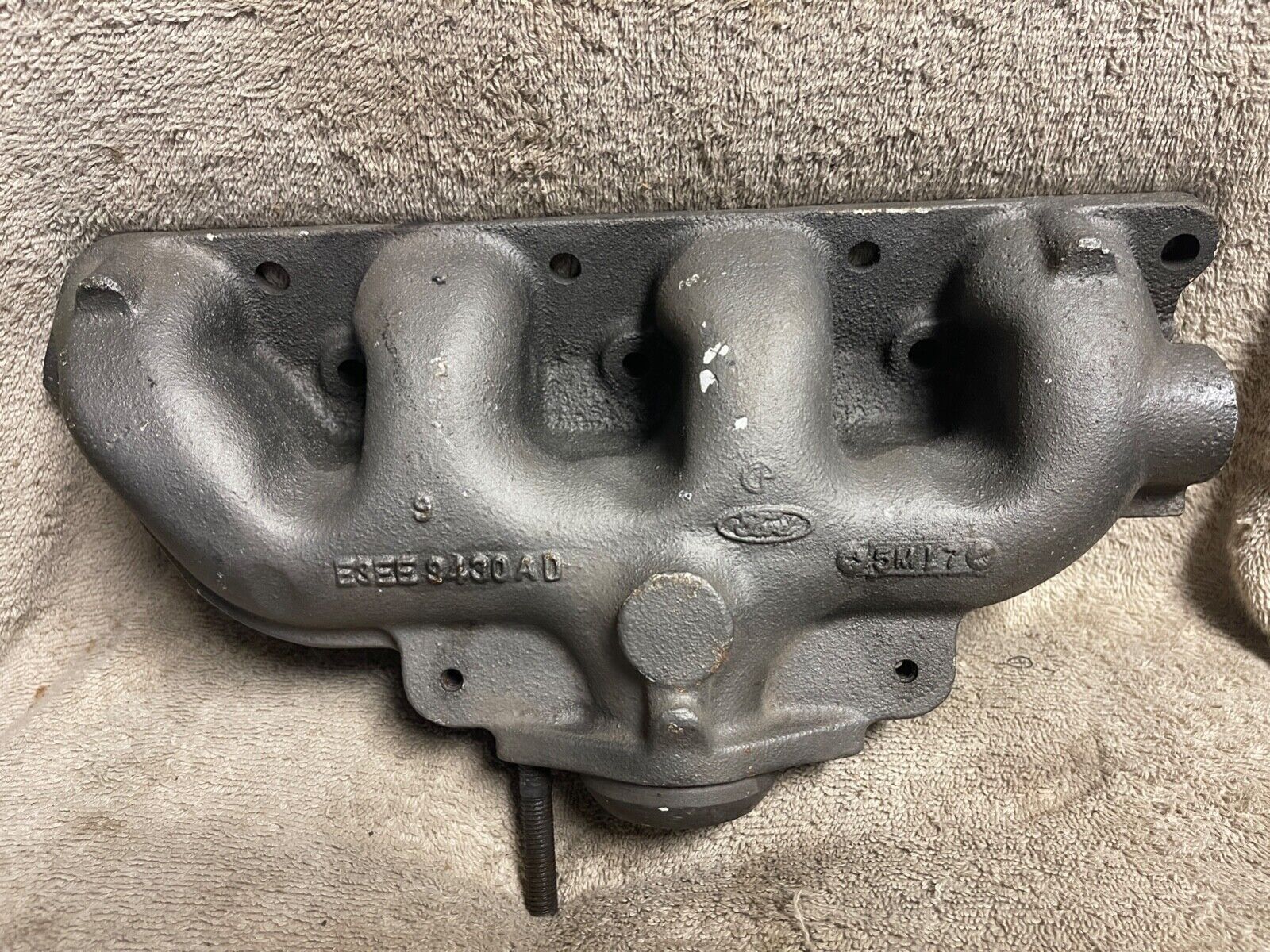 NOS FORD E3EE-9430AD 1984-86 ESCORT EXP LN7 EXHAUST MANIFOLD CAST IRON W/O TURBO