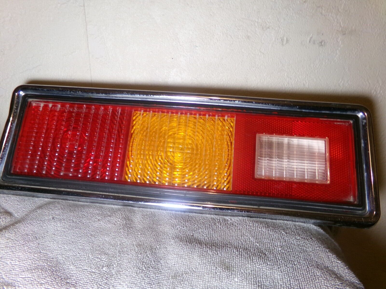 Left hand taillight assembly to fit a 1976 through 1979 Chevy Chevette