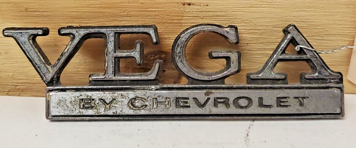 Used 1973-77 Chevy Vega Header Rear Body Panel Emblem 1700895 (892)