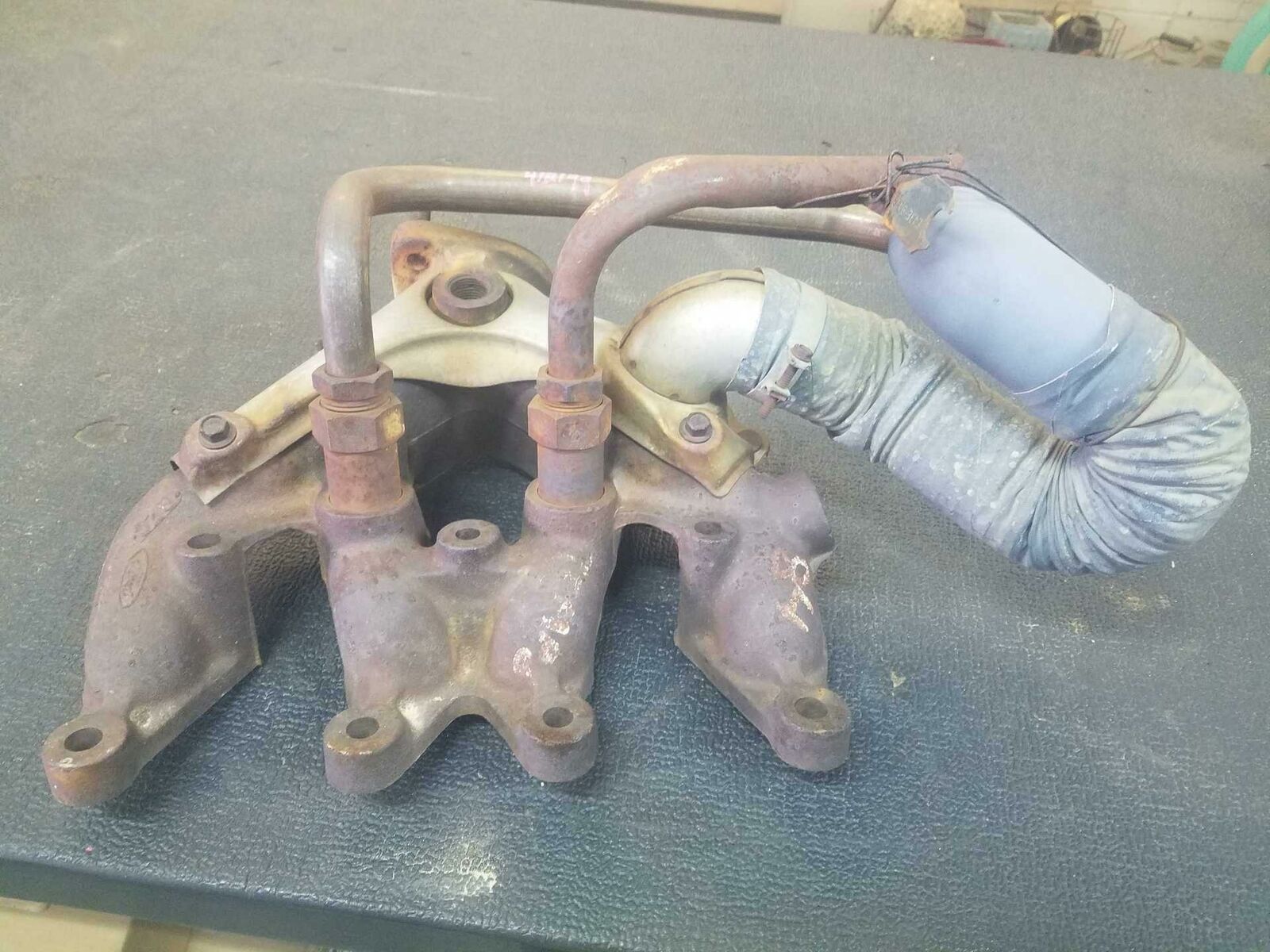 Exhaust Manifold FORD TEMPO 84