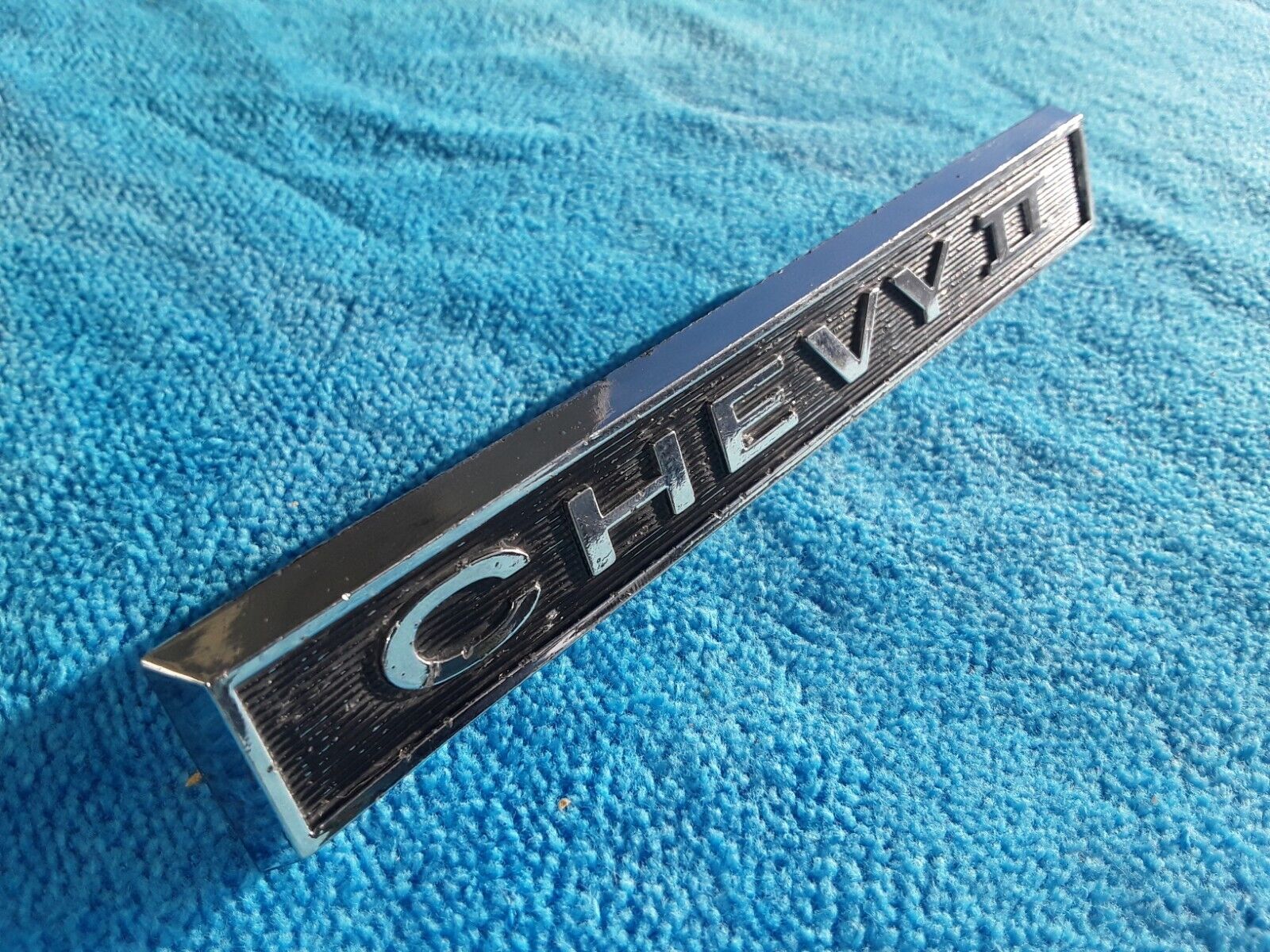 GM 1966 CHEVY II NOVA REAR TRUNK EMBLEM 100 SERIES 66 L79 OEM CHROME SCRIPT GOOD