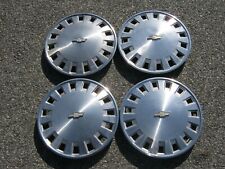 Factory original 1986 to 1990 Chevy Celebrity 14 inch hubcaps wheel covers picture