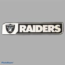 NFL Oakland Raiders Embossed Aluminium Silver and Black Badge picture