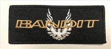 Black BANDIT patch with GOLD embroidered logo with silver and gold bird centered picture