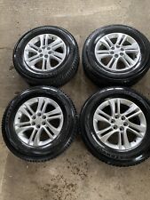 Buick Enclave Chevy Traverse wheels and snow tires picture