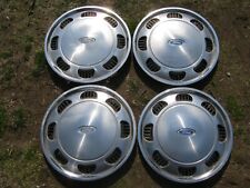 Factory original 1986 to 1990 Ford Tempo Aerostar 14 inch hubcaps wheel covers picture