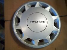 One factory 1991 to 1993 Hyundai Scoupe 14 inch hubcap wheel cover picture