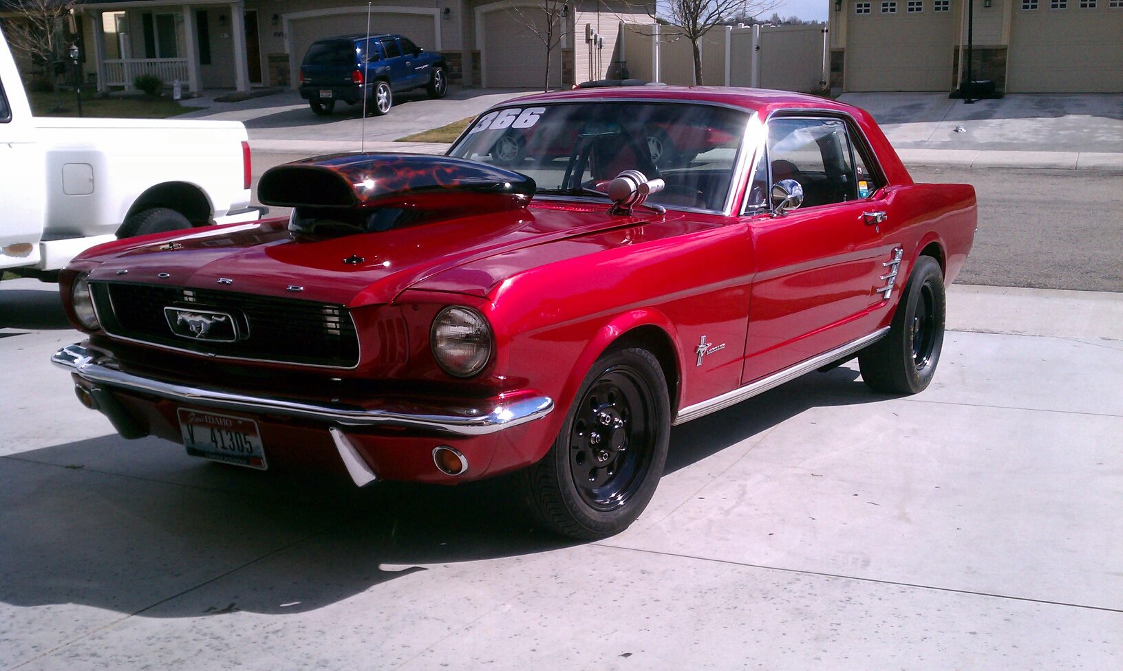 Red 1966 Ford Mustang 