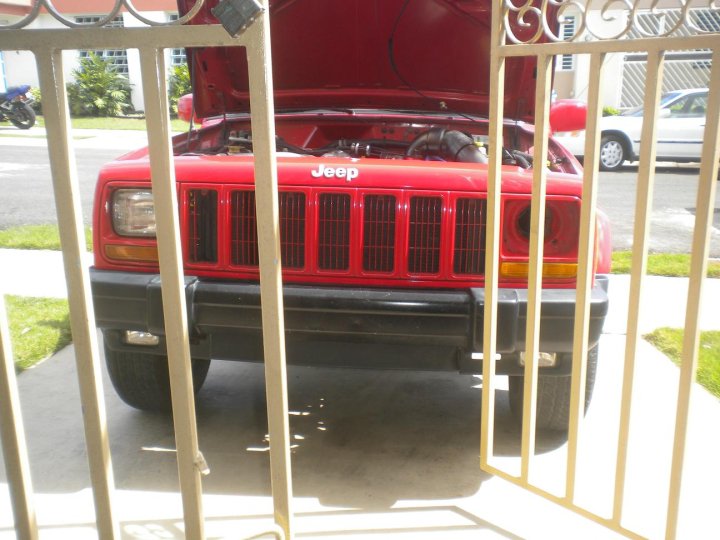 red 1998 Jeep Cherokee sport 