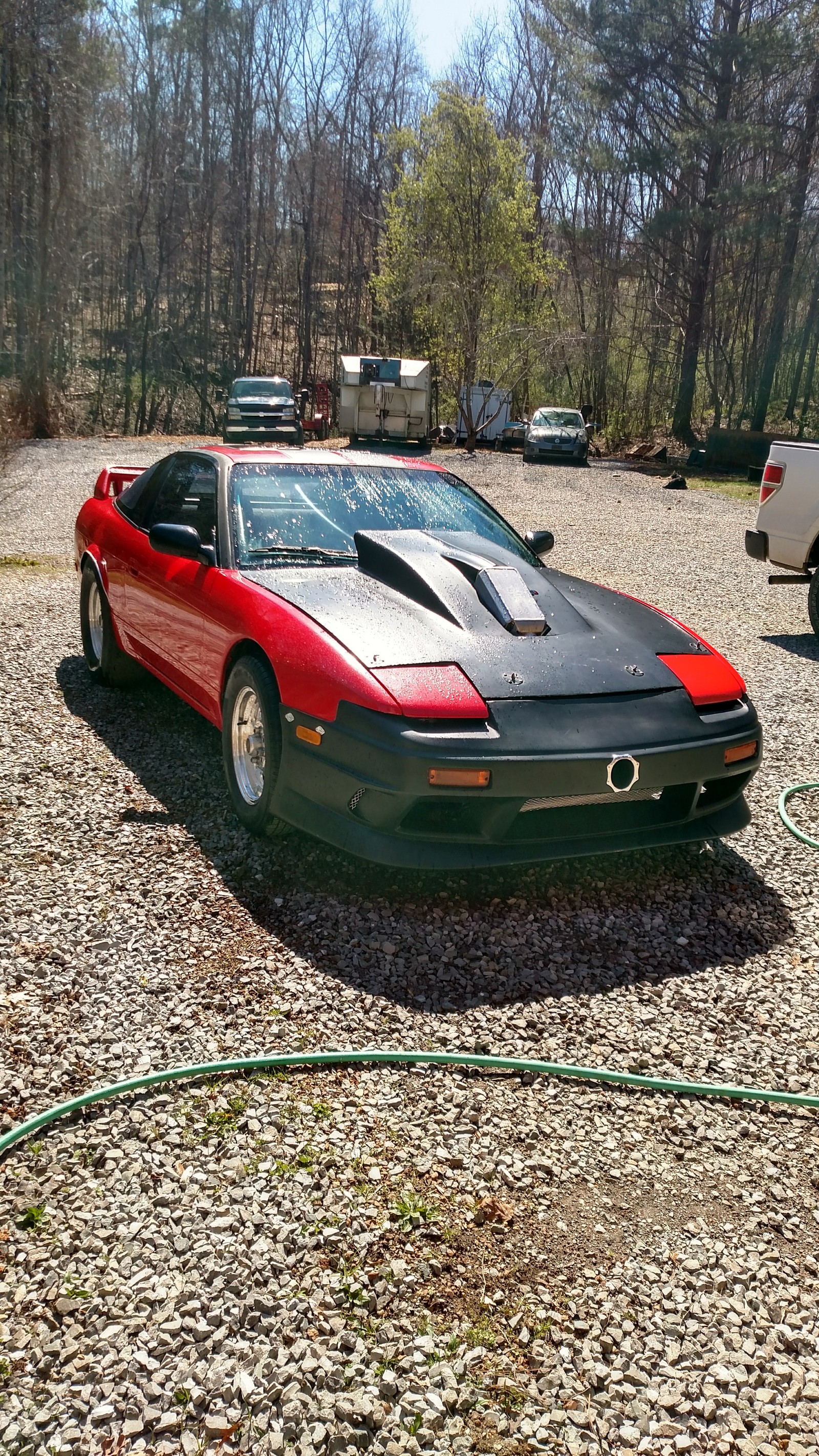 red 1990 Nissan 240SX s13