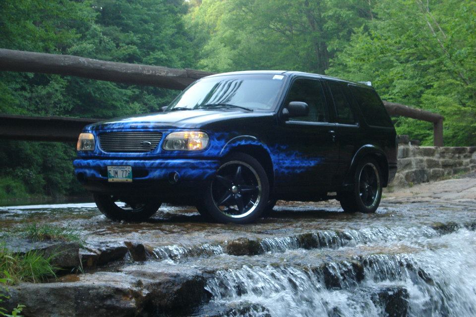black, blue true fire 1998 Ford Explorer sport