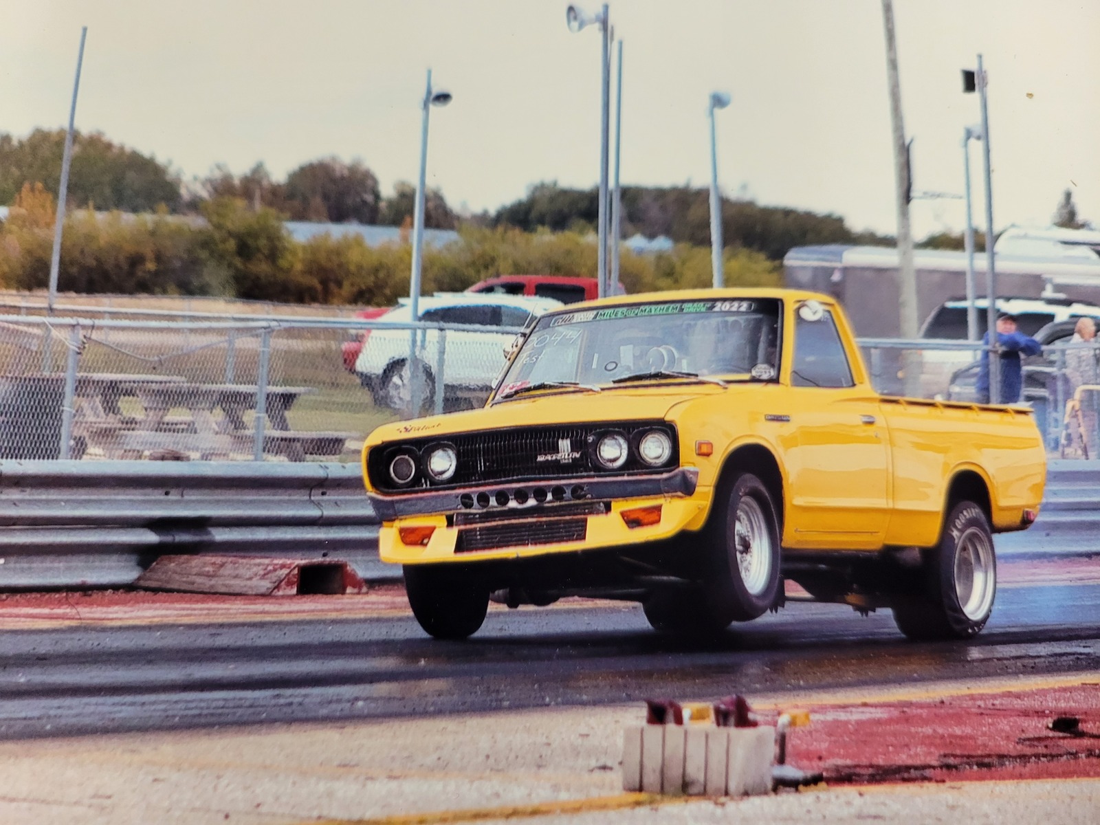Yellow 1977 Datsun Pickup 620