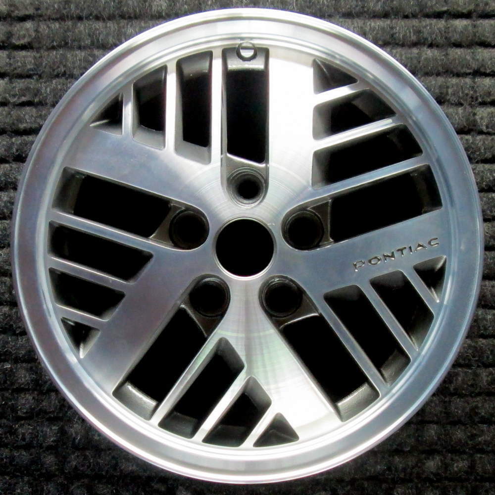 Pontiac Fiero Machined w/ Charcoal Pockets 14 inch OEM Wheel 1984 to 1988