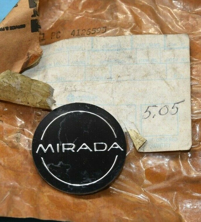 NOS Mopar 1980-81 Dodge Mirada wheel cover medallion