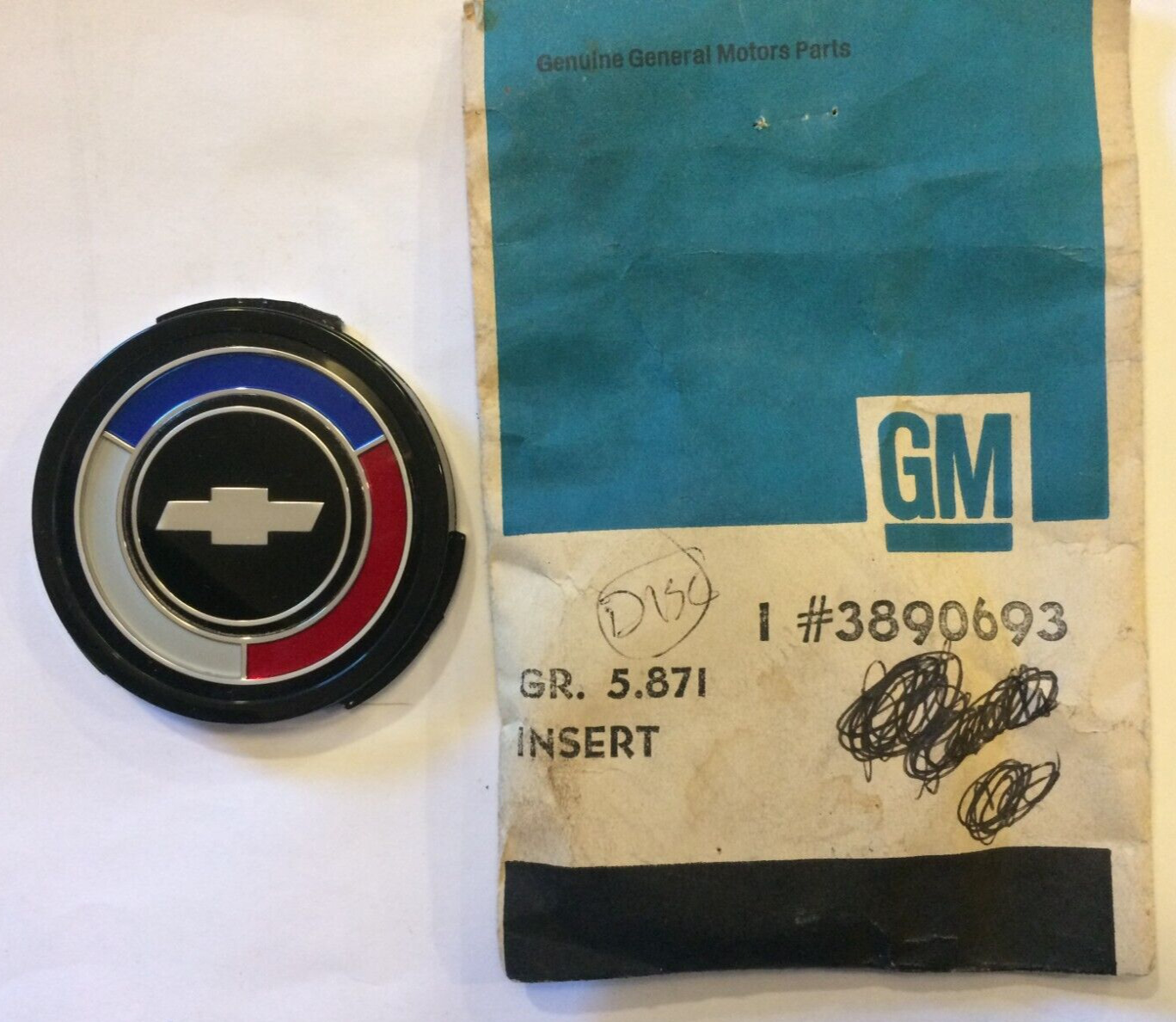 One NOS GM #3890693, 1967-1968 Chevelle Wheel Cover Emblem