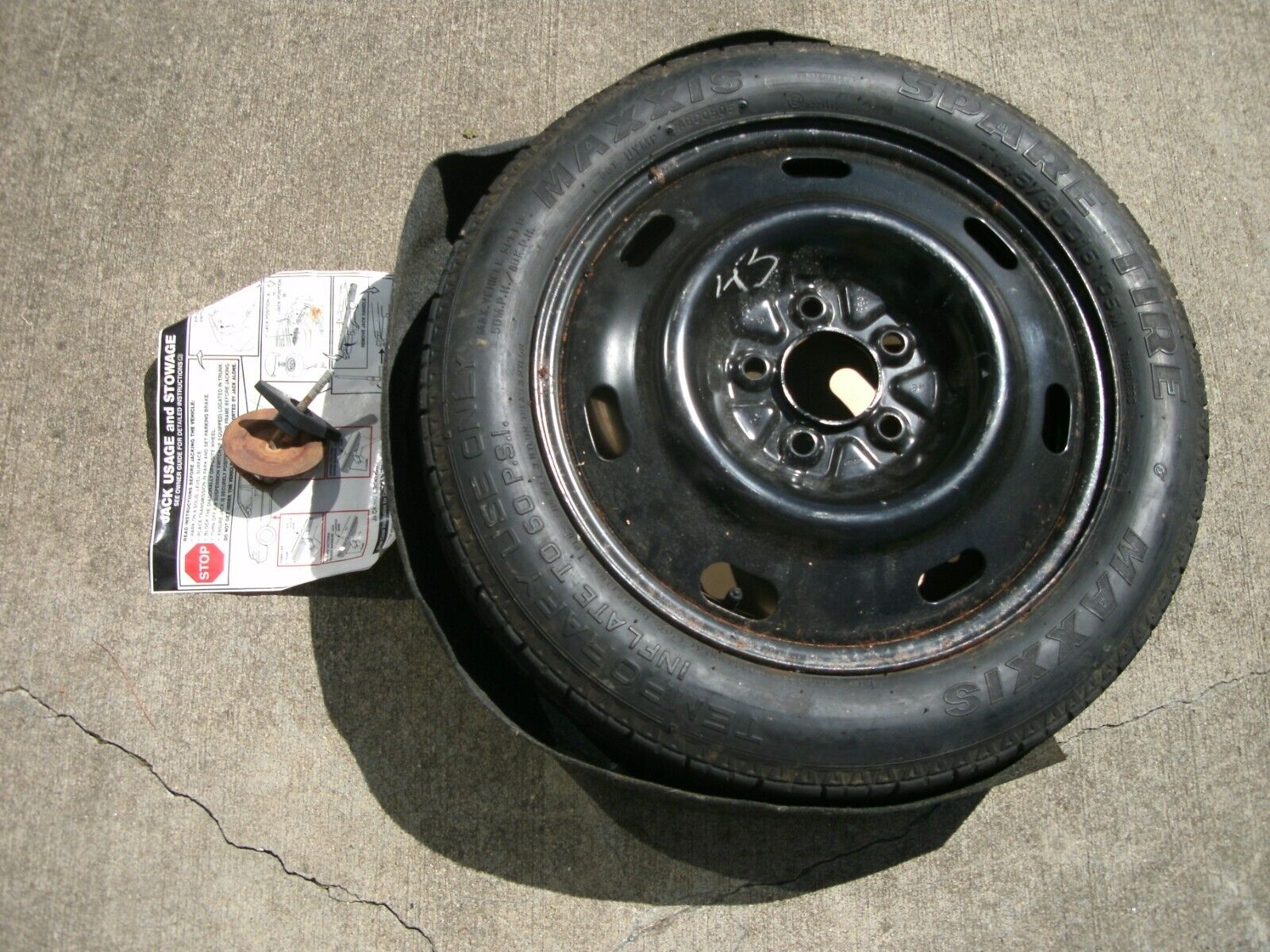 05 Mercury Grand Marquis spare wheel tire w/cover & hook