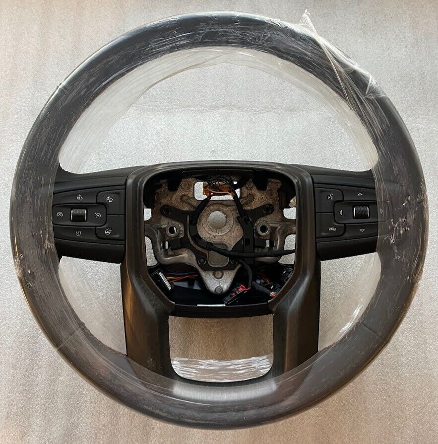 OEM black tan heated steering wheel for some 2019+ Sierra trucks. AT4 vulcan