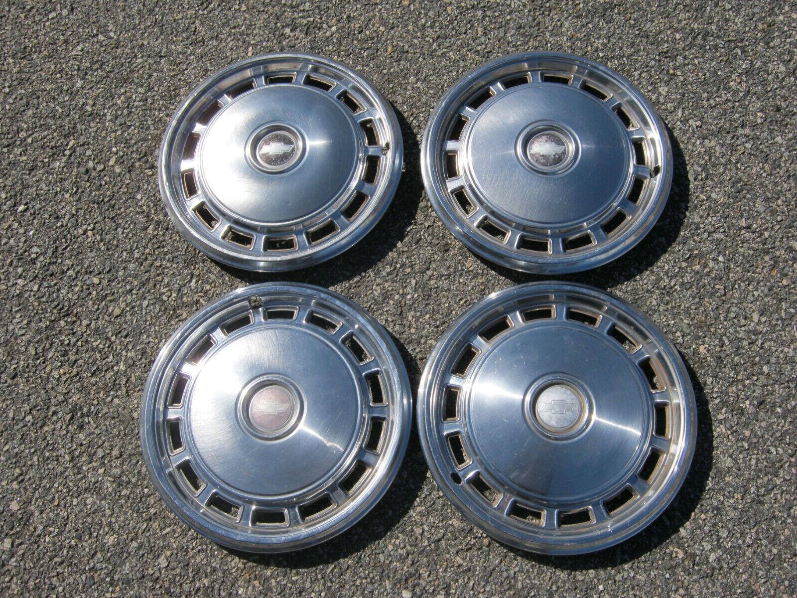 Factory 1975 to 1980 Chevy Monza Vega 13 inch metal hubcaps wheel covers