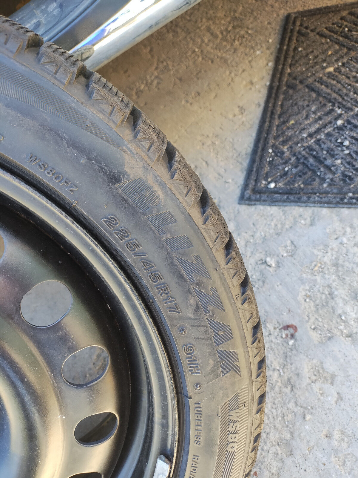 Bridgestone Blizzak tires 225/45R17 on rims that fit a 2017 WRX