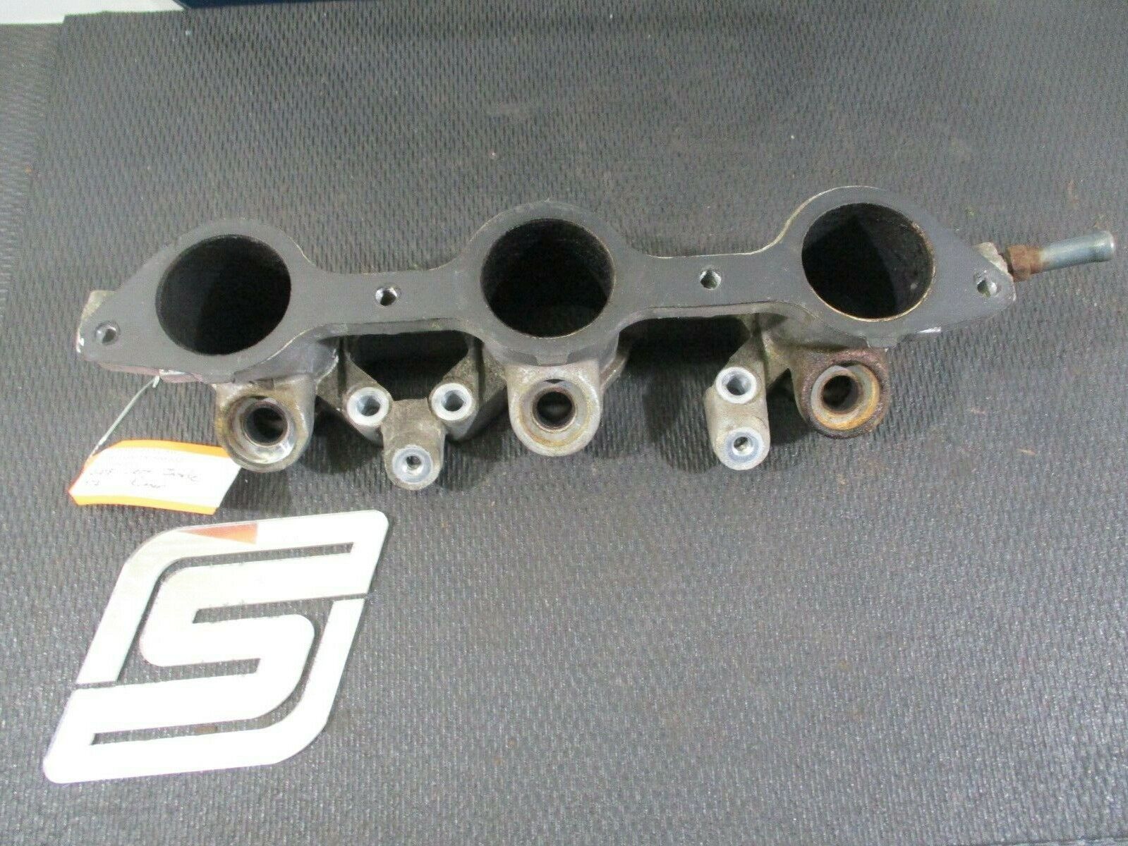 1996 Subaru SVX Left Driver Side Lower Intake Manifold Runner Injector Base