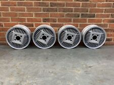 Set of 4 early MG Metro Alloy Wheels NOS NAM5849 picture