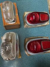 RENAULT DAUPHINE EARLY SET OF ORIGINAL N.O.S. TAIL LIGHTS & N.O.S. FRONT LENSES picture