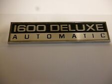 FORD CORTINA ESCORT 1600 DELUXE AUTOMATIC BADGE NOS picture